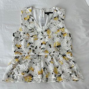 Brand new lemon lace shirt. Never worn before! Beautiful and unique.